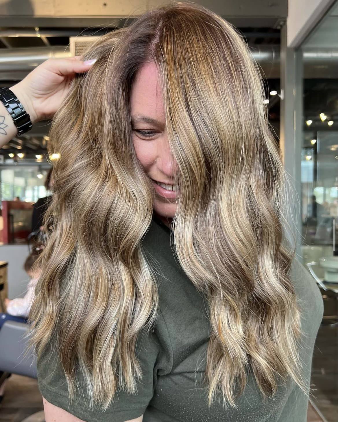 Woman with curly dirty-blonde hair