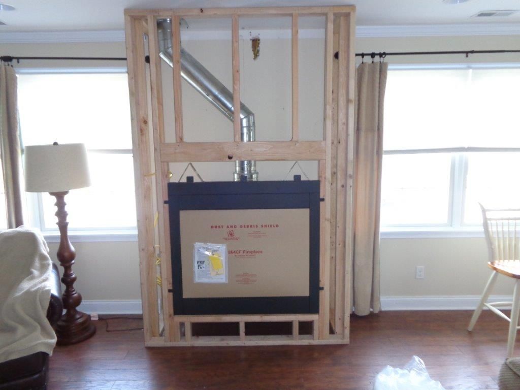 Install fireplace and venting.