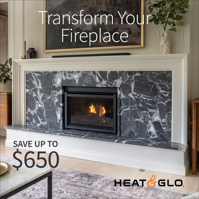 Fireplace with marble facing and a fire, advertisement for Heat & Glo with 
