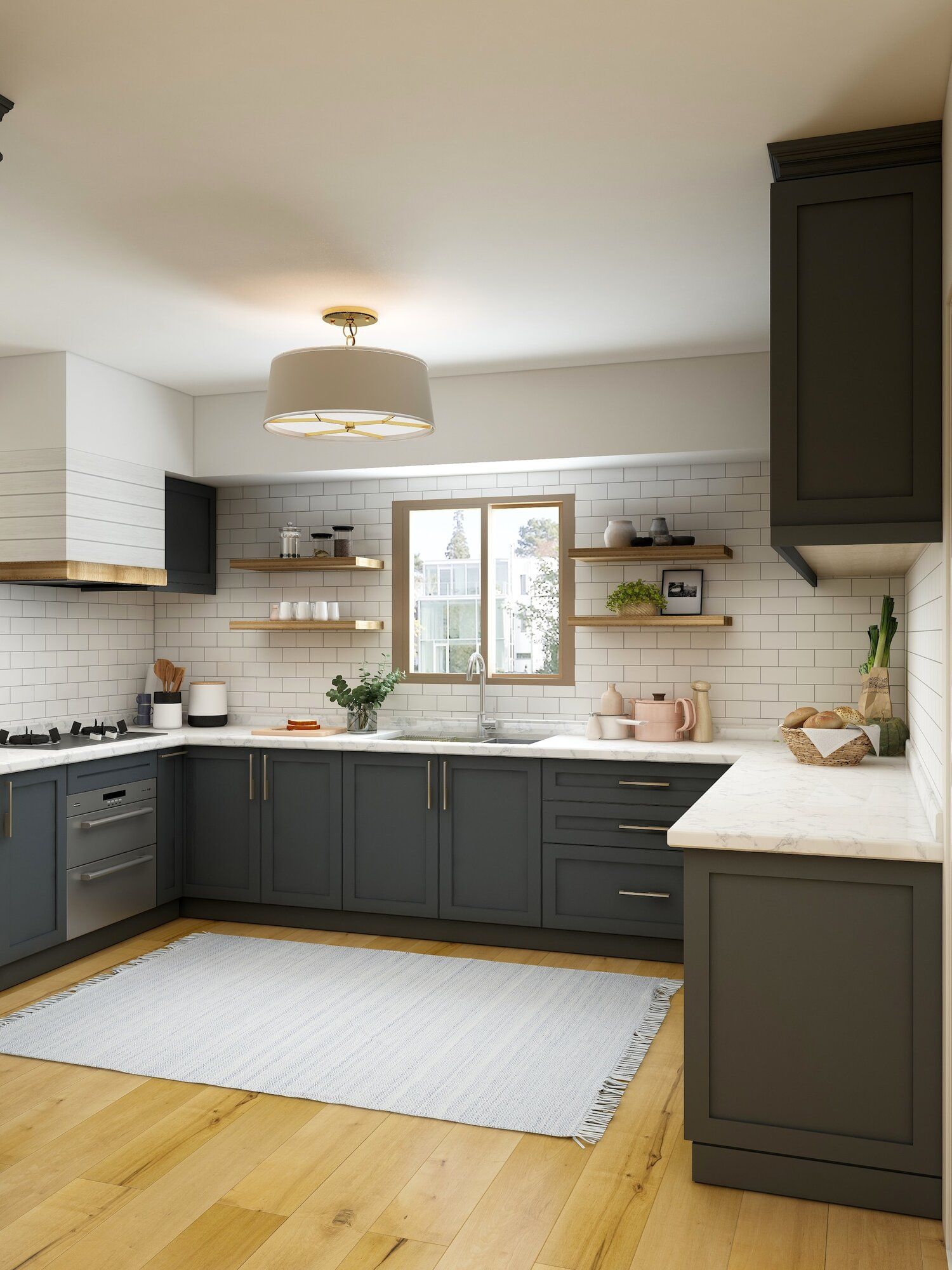 A kitchen with gray cabinets , white counter tops , a rug and a window.