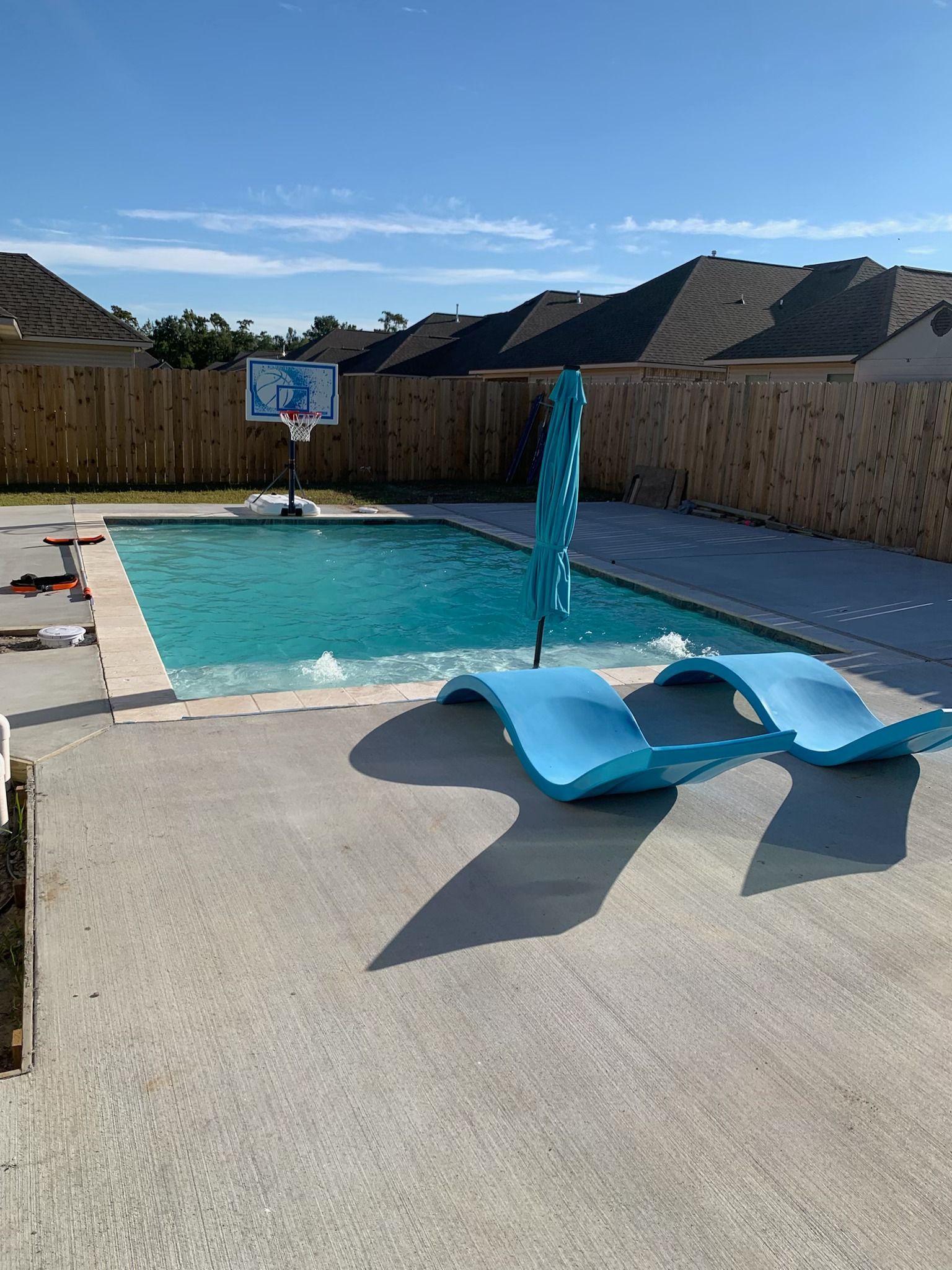 In-ground pool with water feature and shade canopy, Baton Rouge, LA