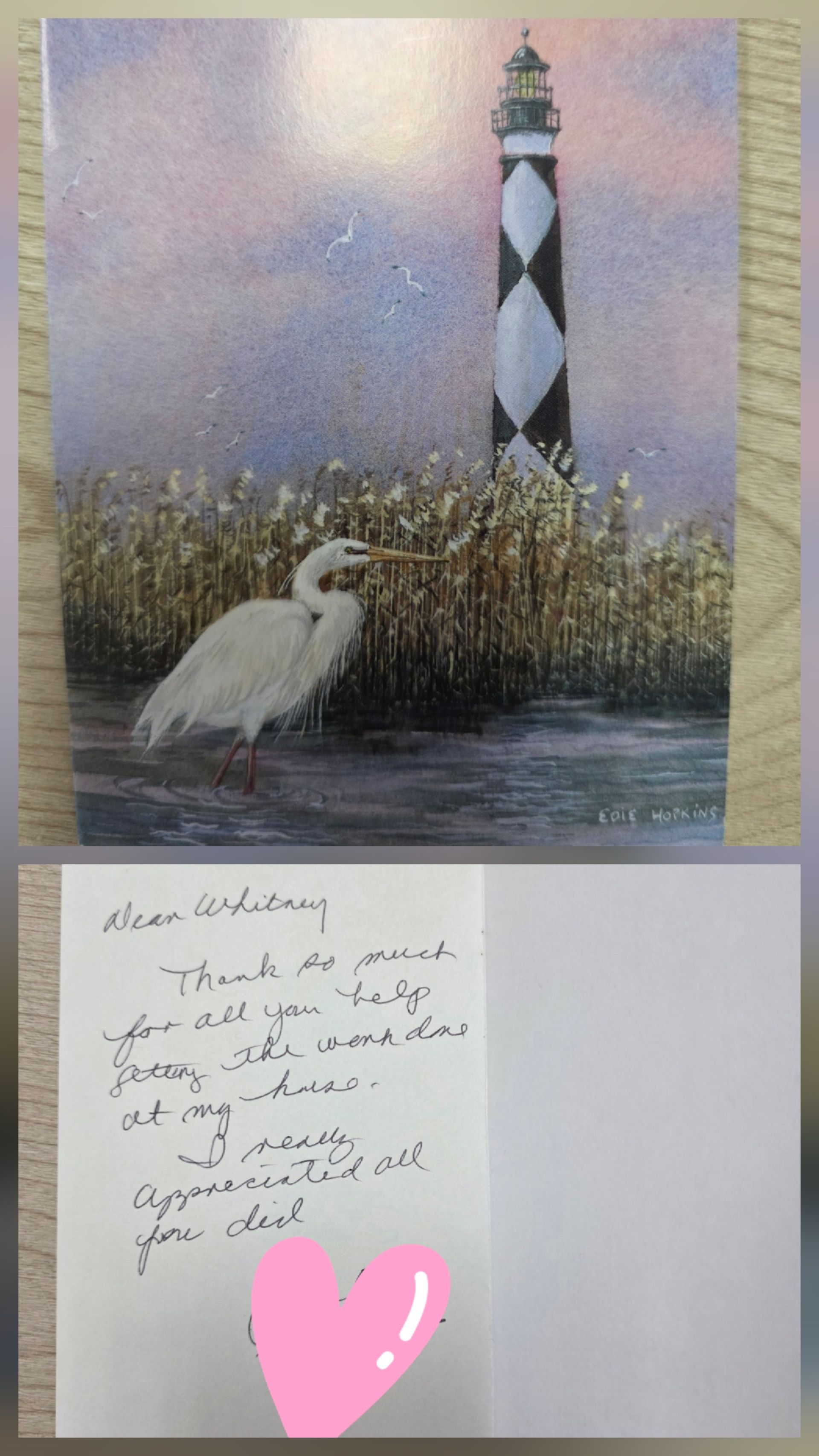 A card depicting a lighthouse and heron, with a handwritten thank-you note inside and a pink heart sticker covering text.