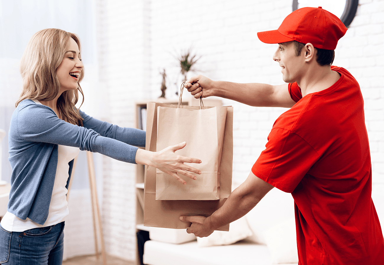 Learn More About Food Delivery delivery man delivering food on paper bags