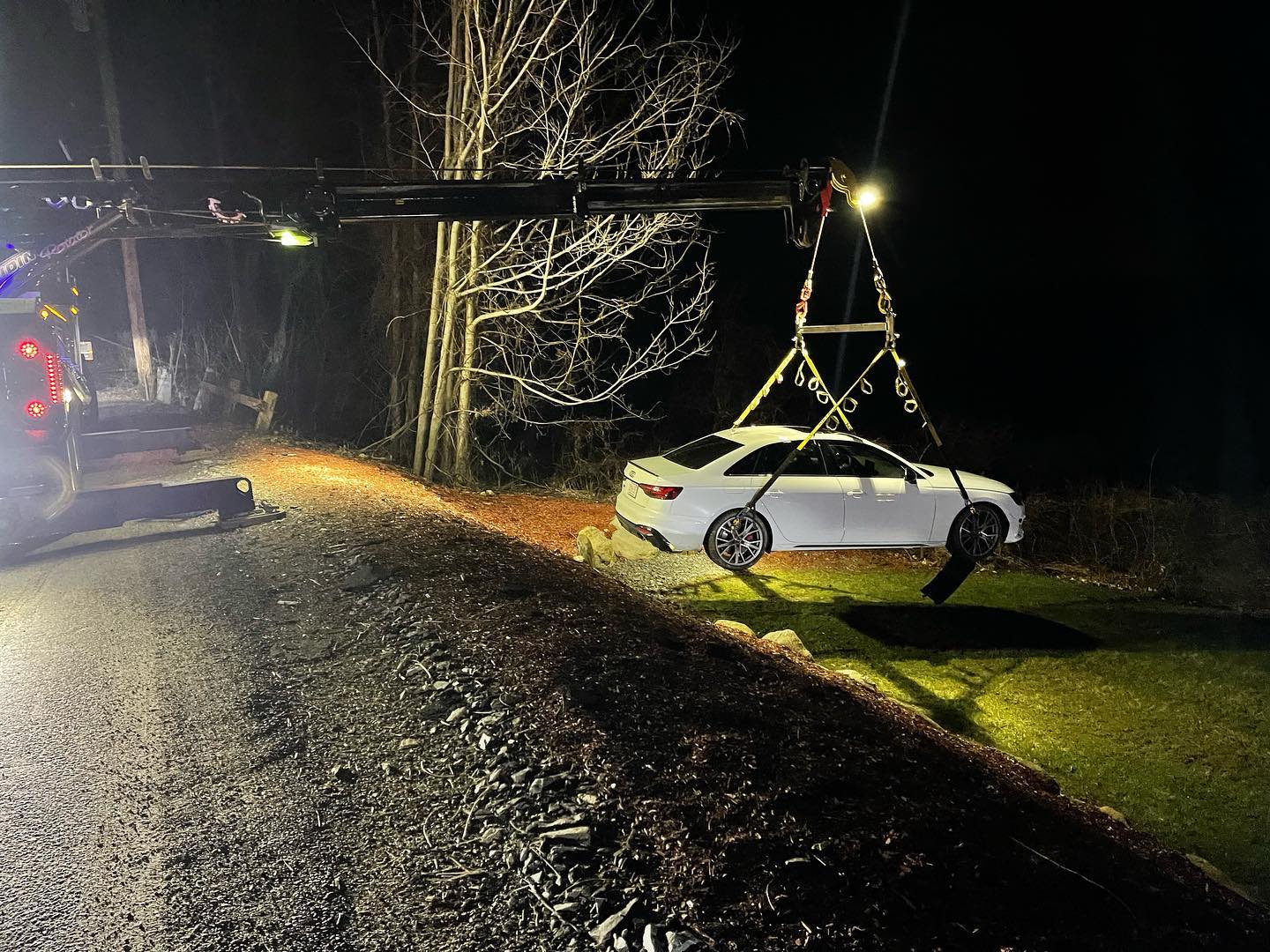 White car being towed