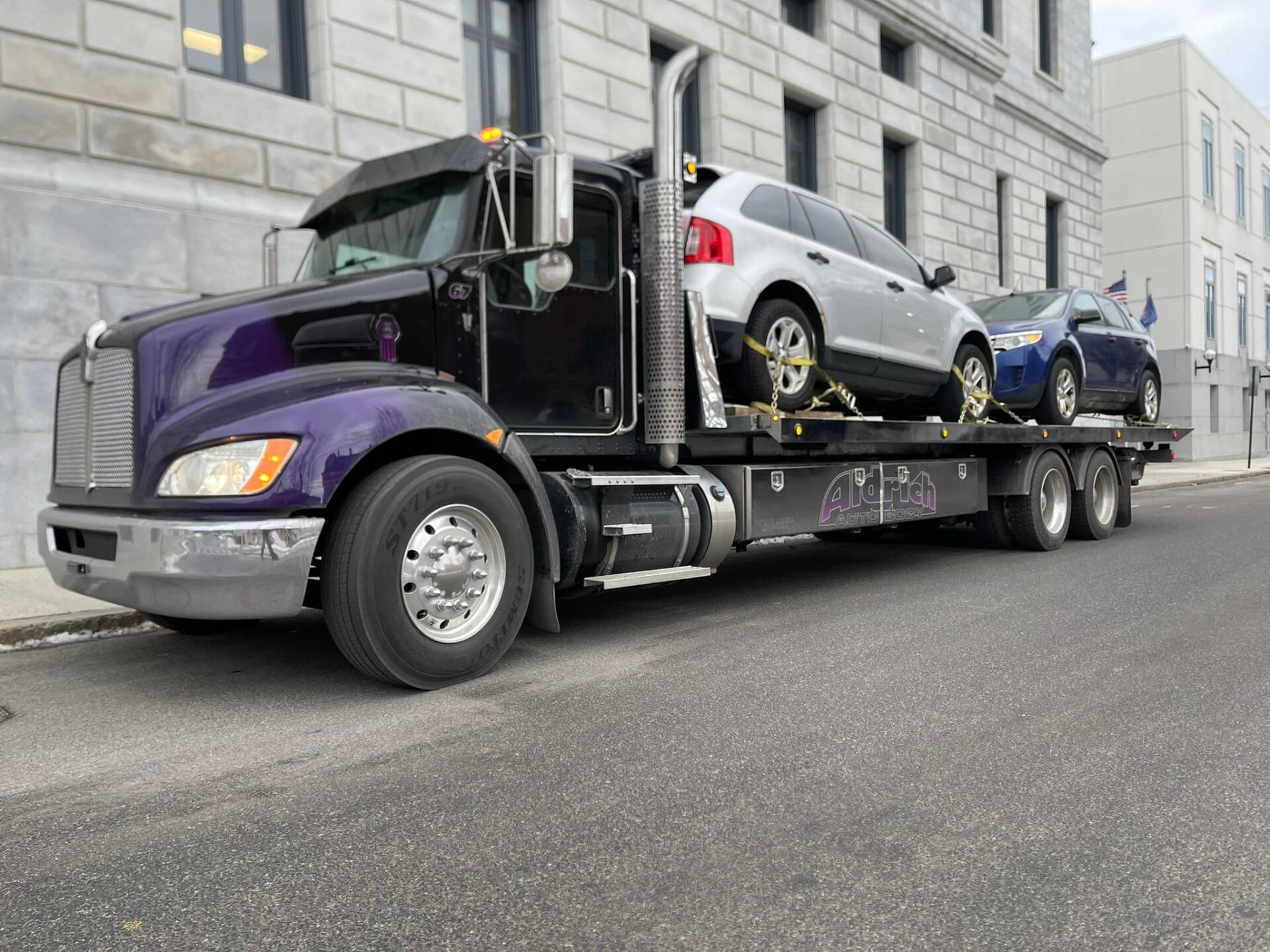 Towing truck with cars
