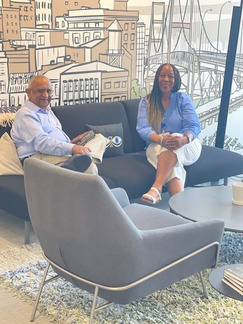 Jackie and Vora sitting on a couch