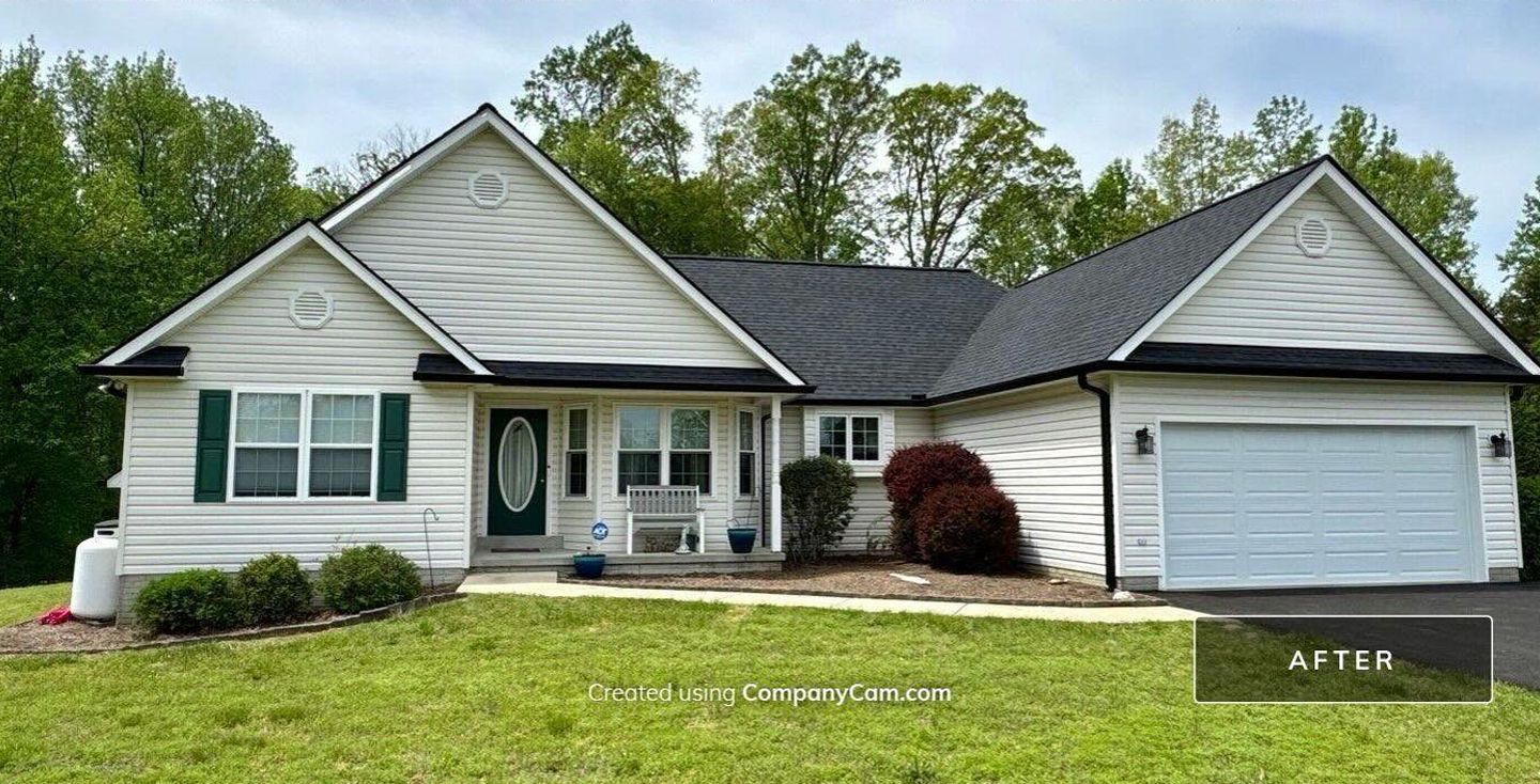 Single-story beige house with gray roof, front porch, attached garage, and landscaped yard.