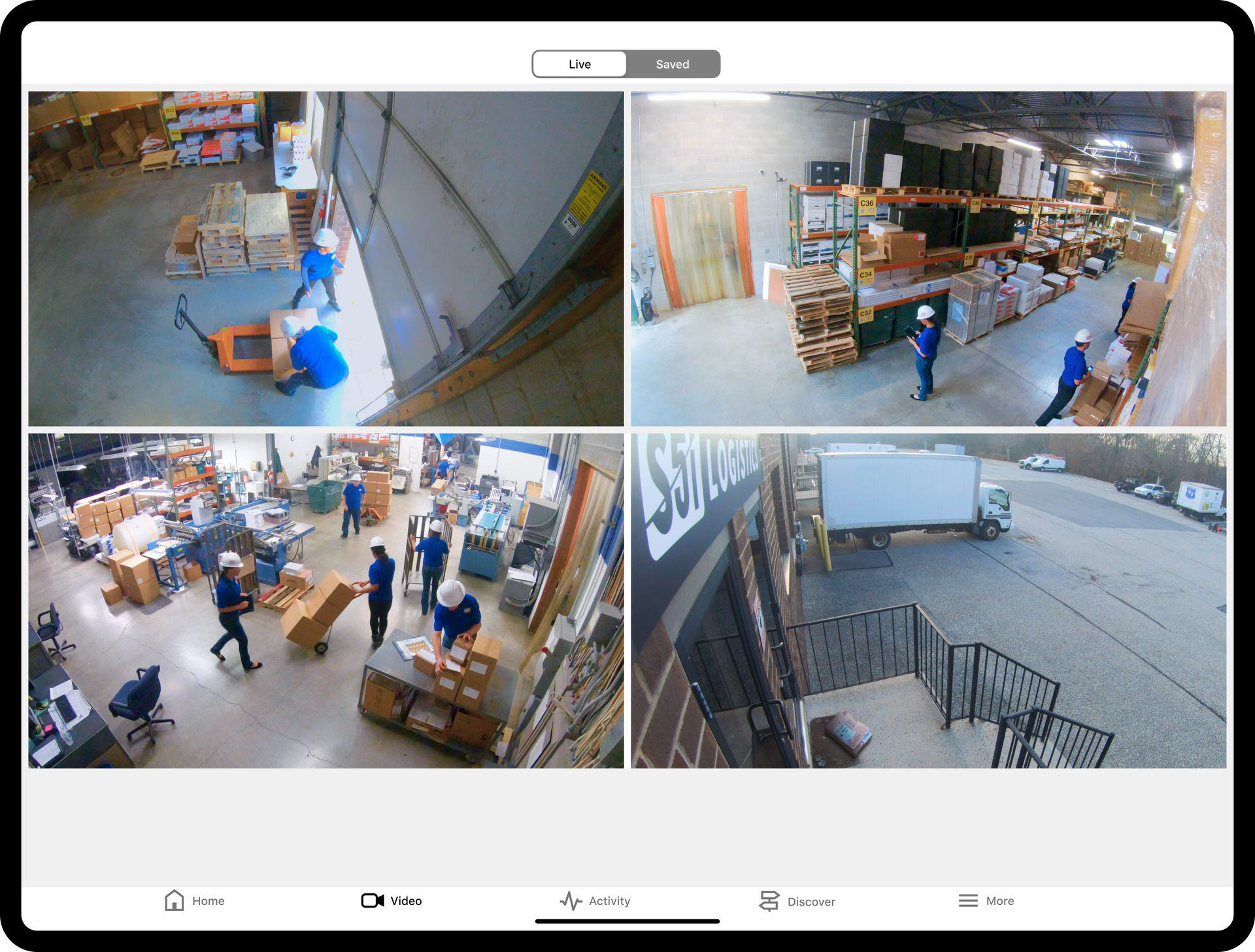 A tablet with four pictures of a warehouse on it.