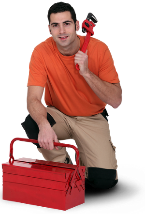 A crouching man holding a red wrench with a toolbox below him