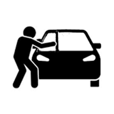 Person trying to break into a black car.