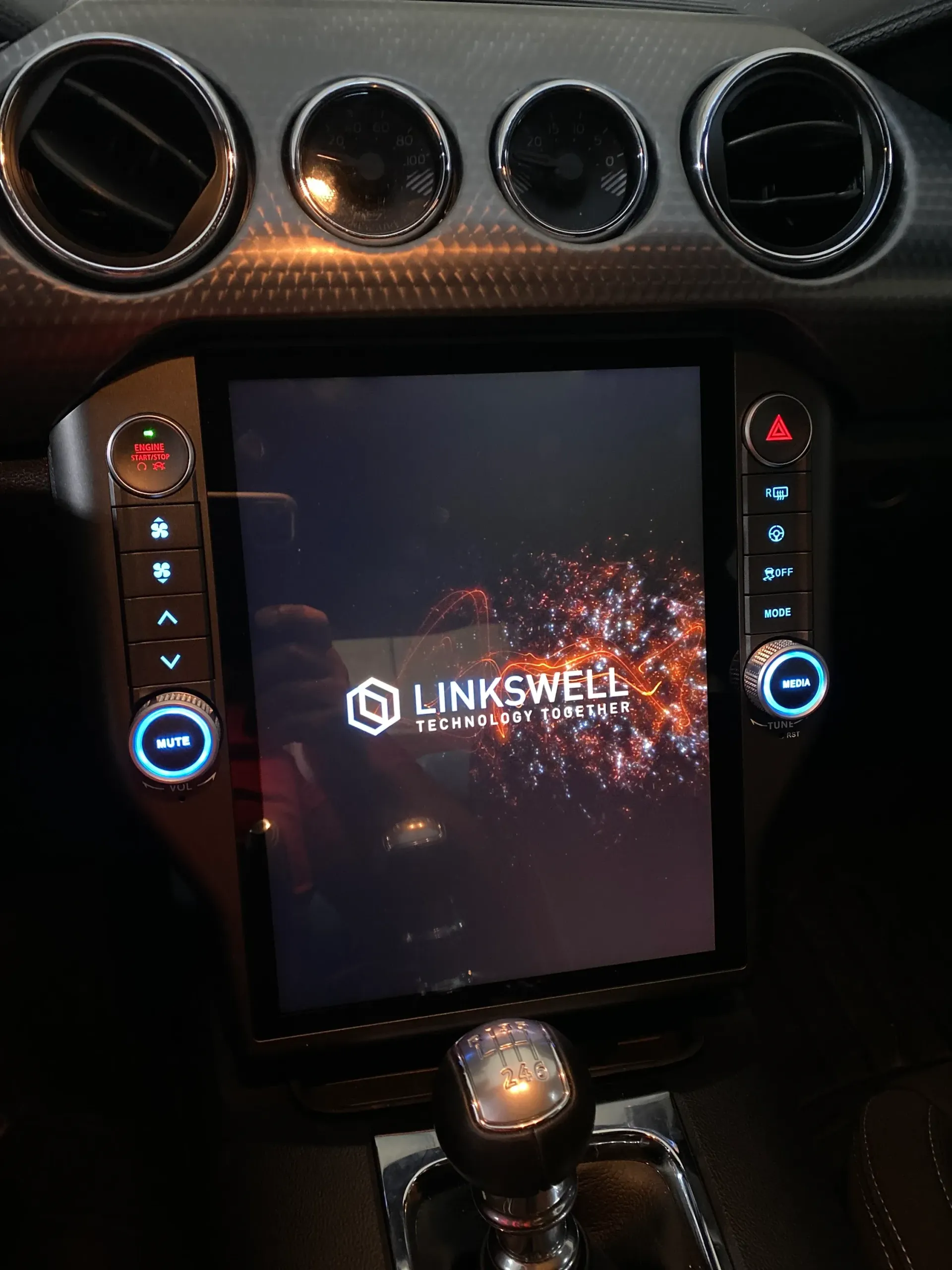 Car interior with a large touchscreen displaying the 