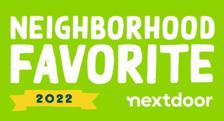 a green sign that says neighborhood favorite 2022 nextdoor