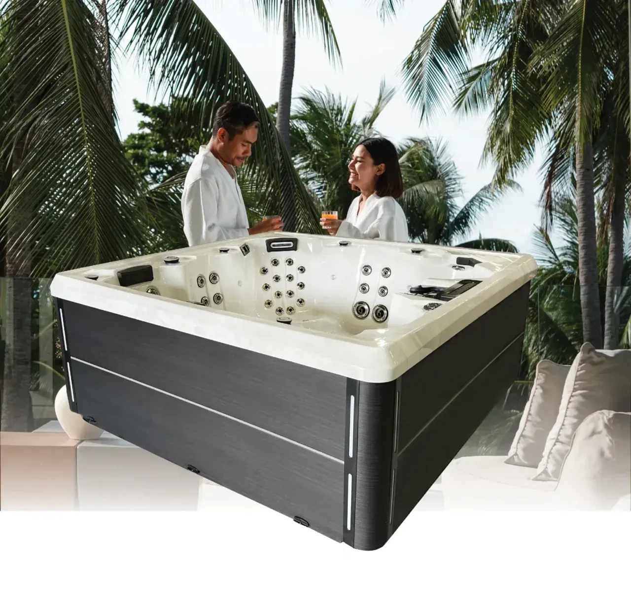 A man and a woman are sitting in a hot tub