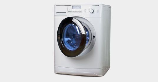 The washing machine on a white background
