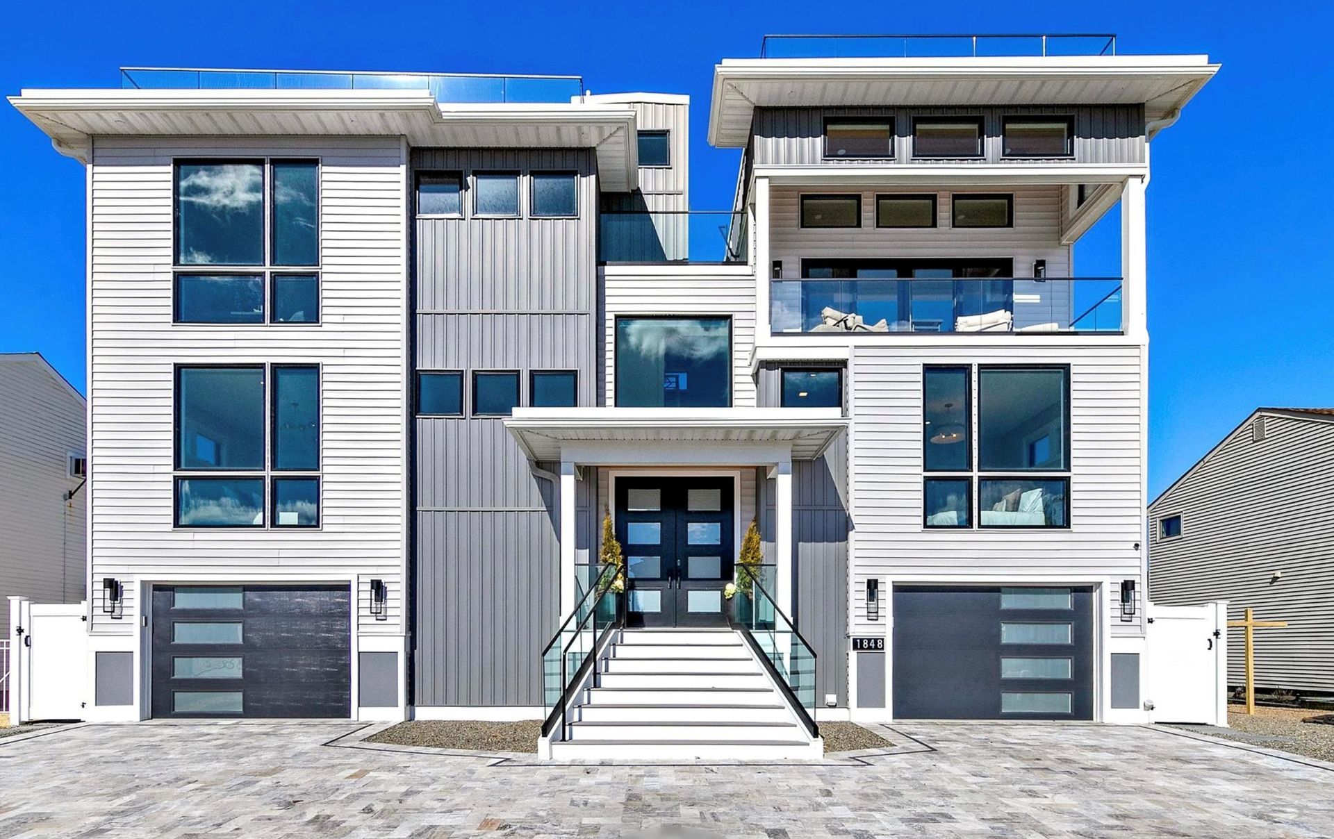 A large white house with a lot of windows