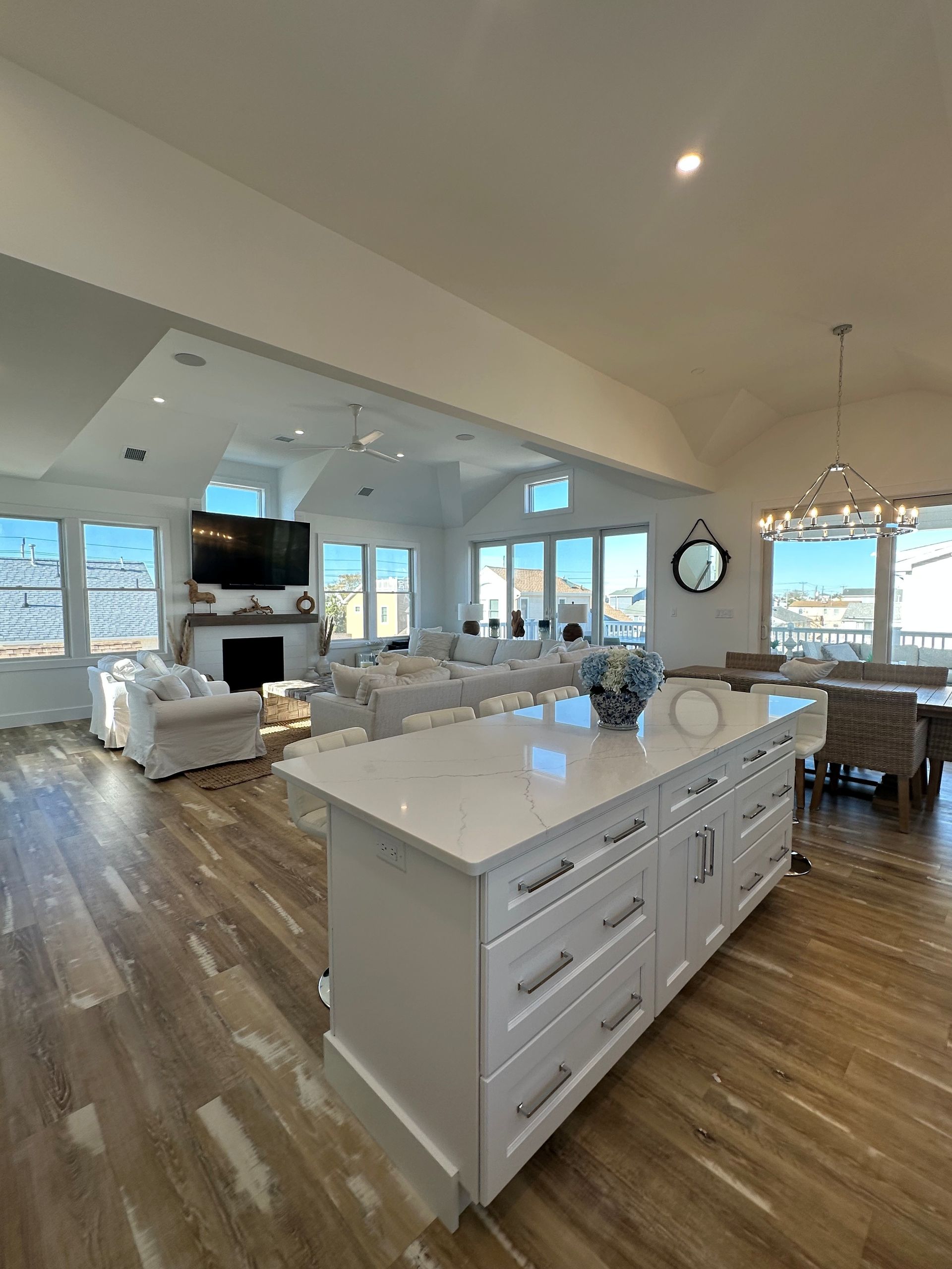 There is a large island in the middle of the living room.