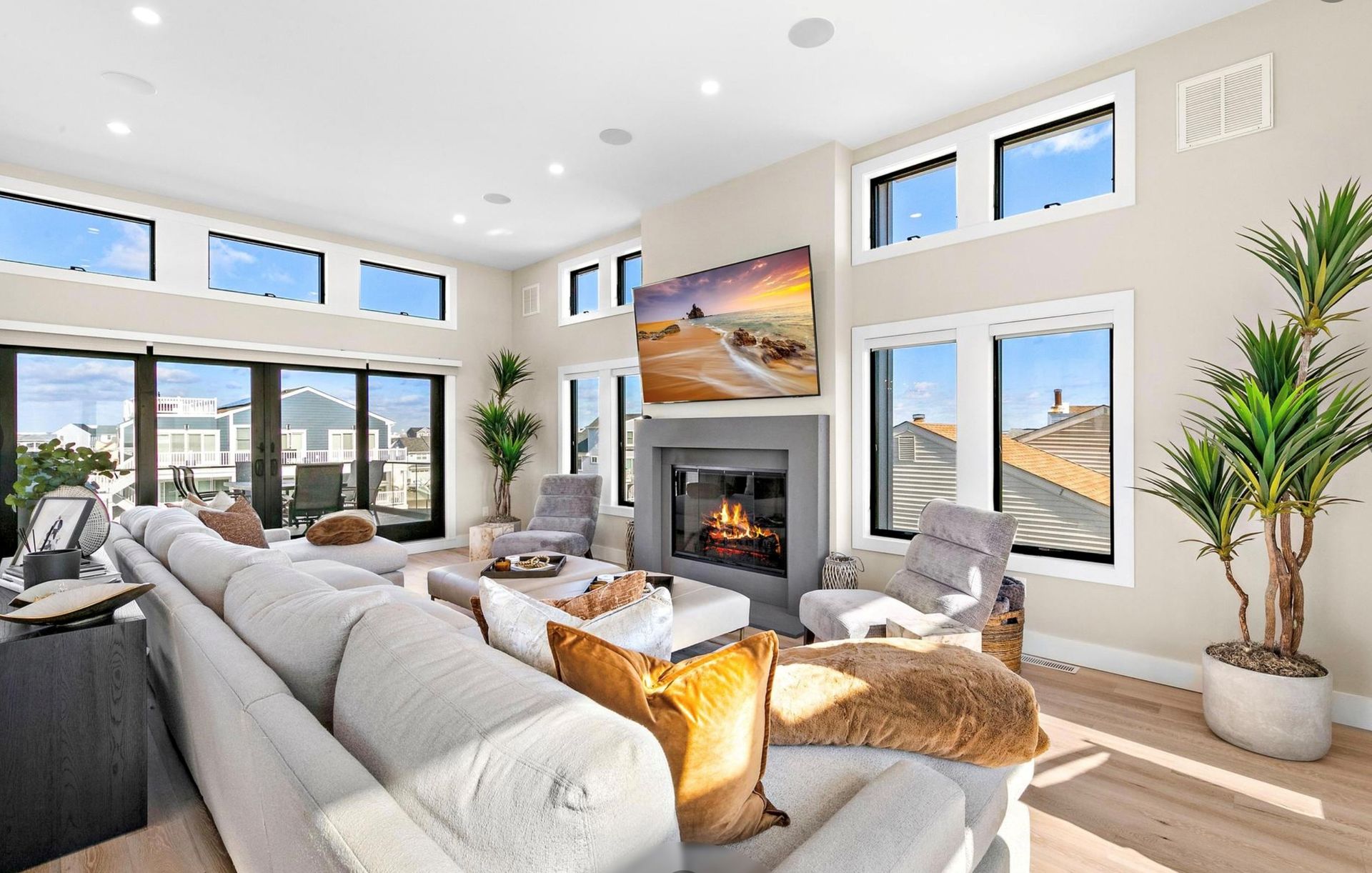 A living room filled with furniture and a fireplace.