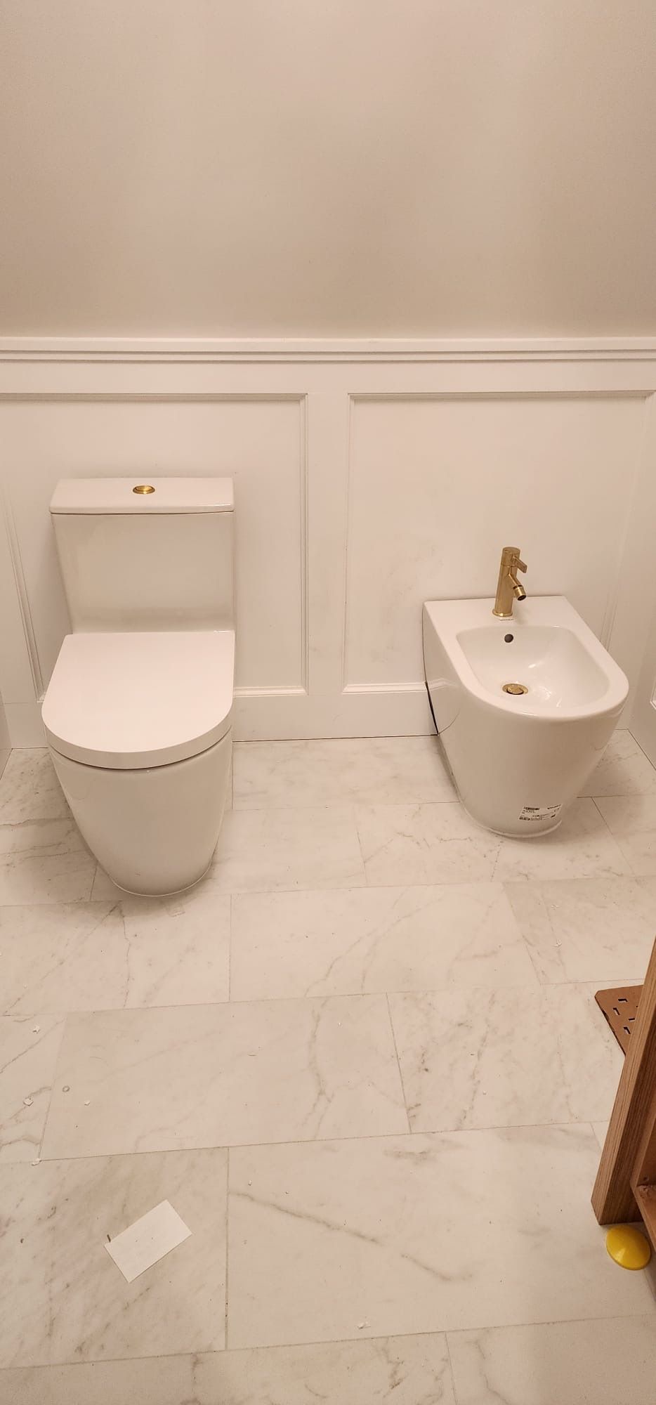 Toilet and sink in the bathroom