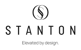 A pink gift card for ashley stark home with a logo on it.