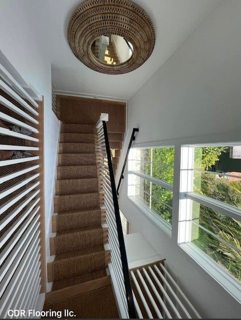 A picture of a staircase taken by cor flooring llc