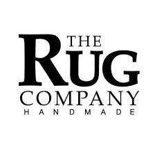 A black and white logo for the rug company handmade.
