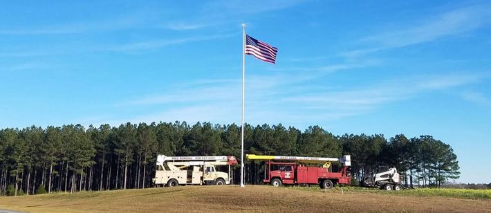 Tree Service Trucks and Flag