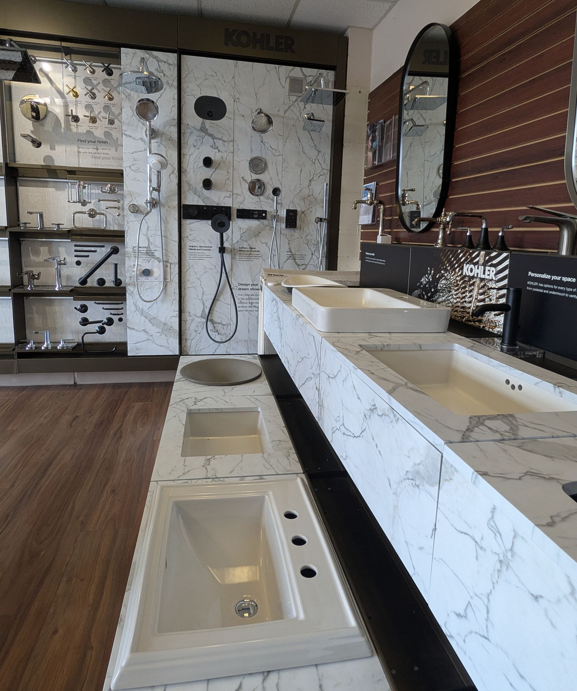 A bathroom with a lot of sinks and a mirror