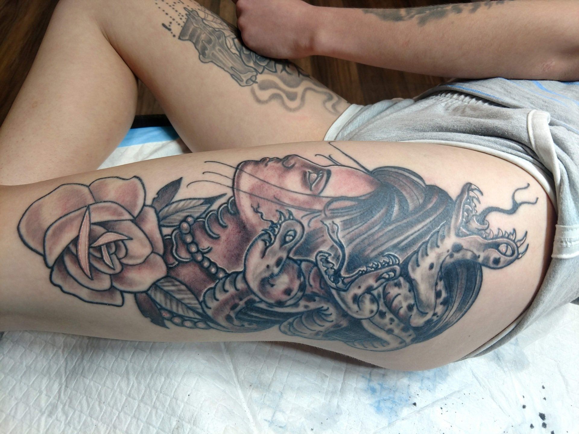 Tattoo artists work