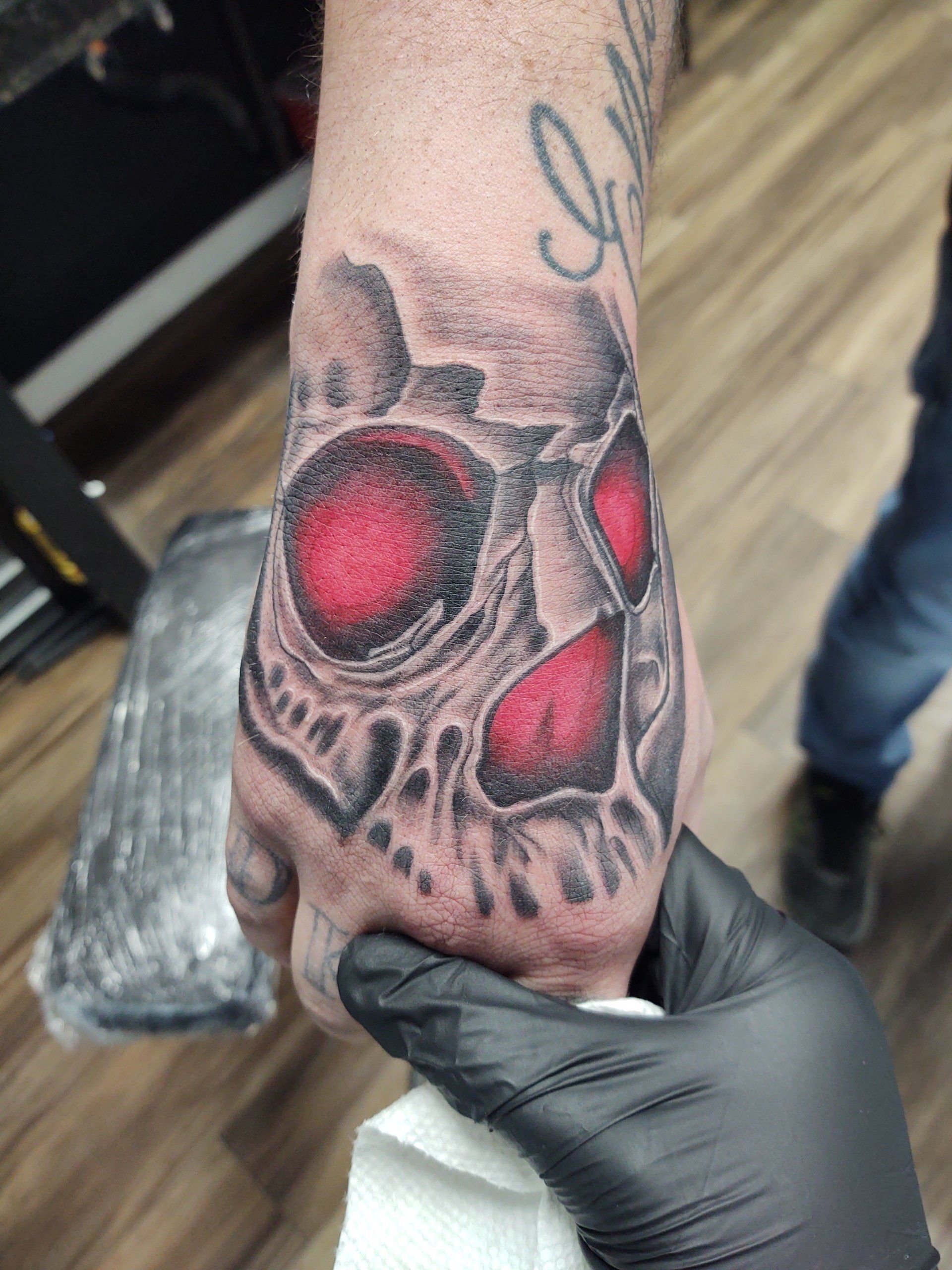 Tattoo artists work