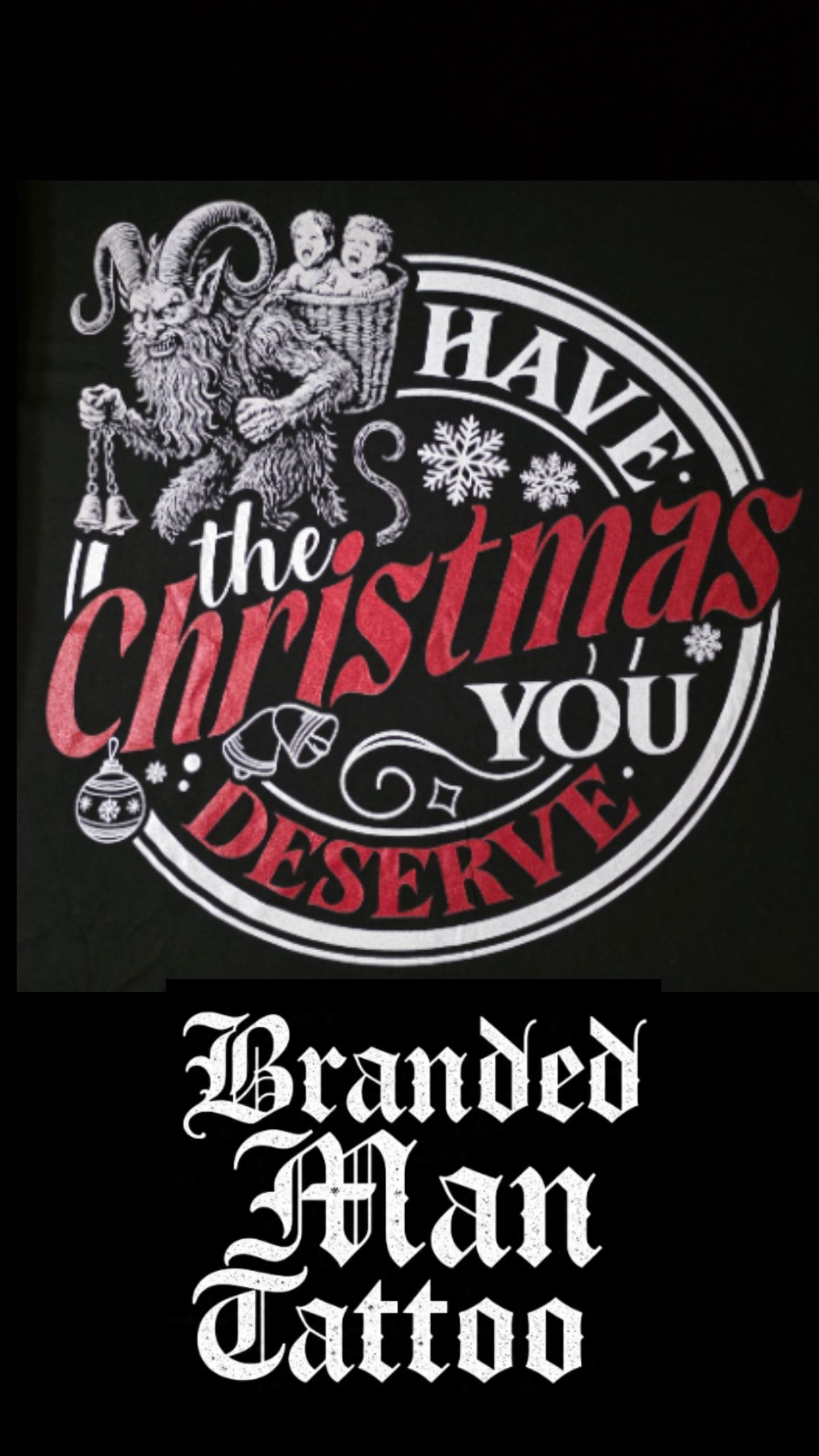 Krampus-themed tattoo design: Have the Christmas You Deserve with a demon holding a bell. Branded Man Tattoo below.