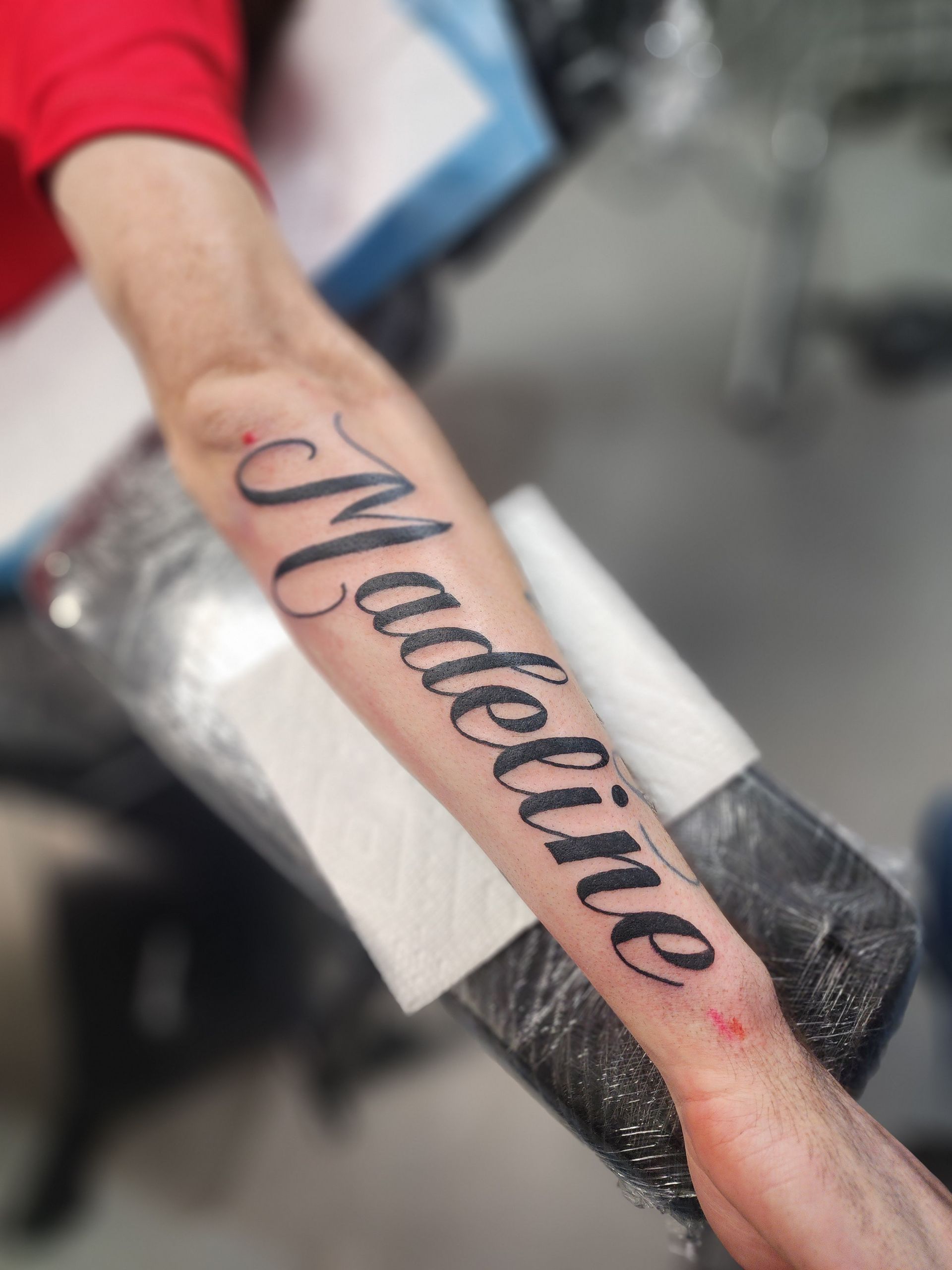 Tattoo of the name