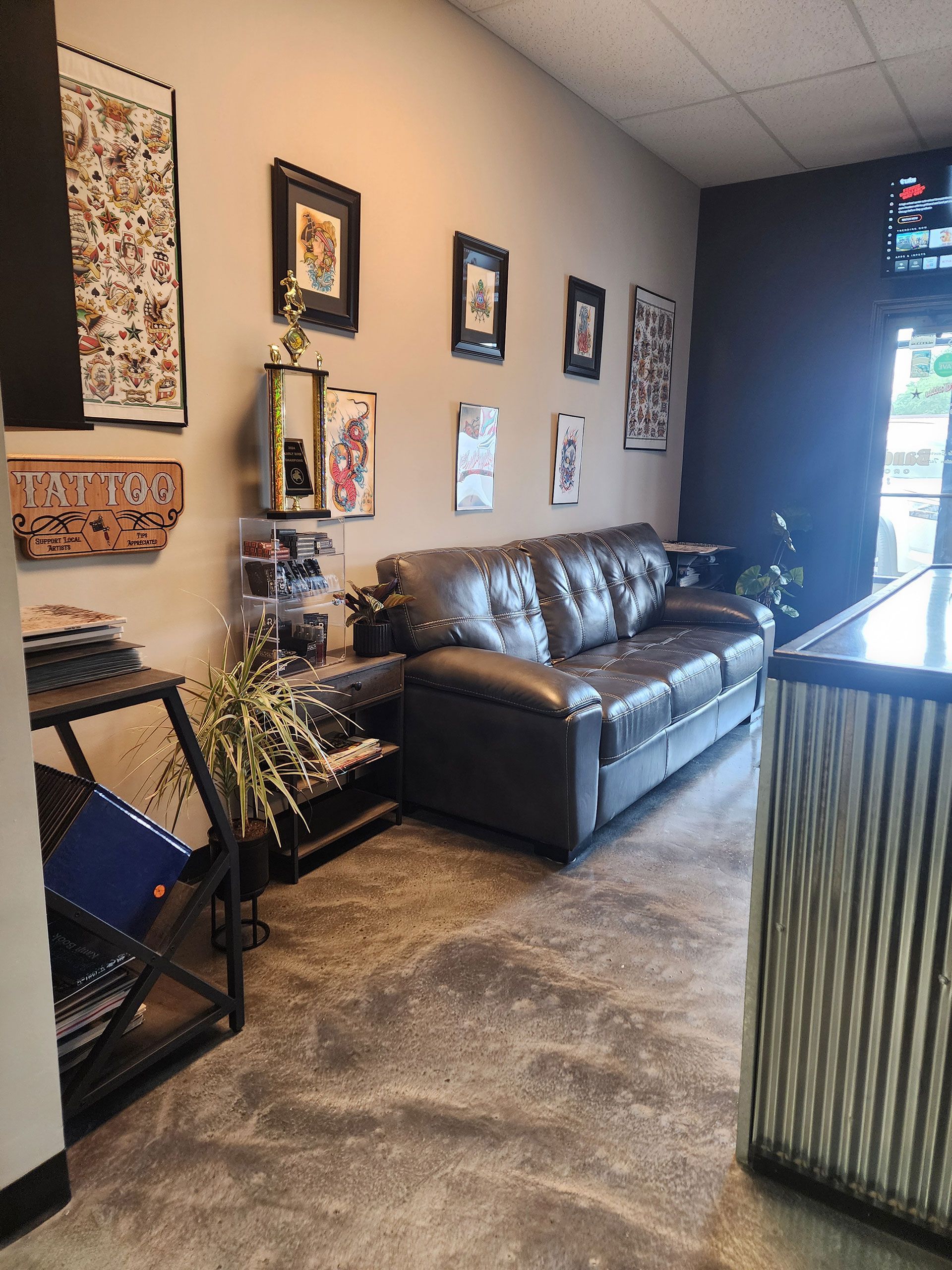 A living room with a couch and a counter