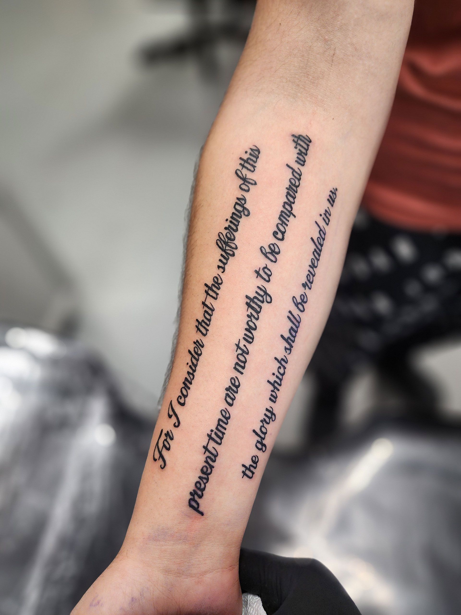 A tattoo message on an arm