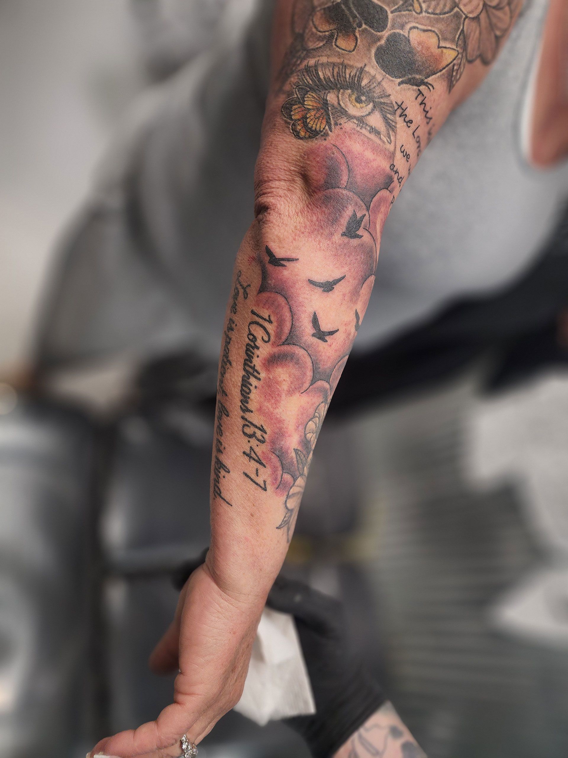 Tattoo with bible verse on arm