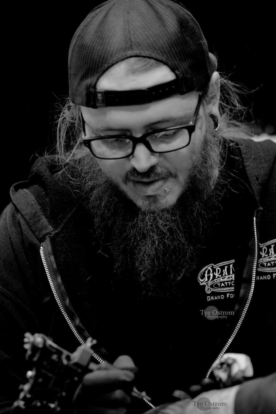 Isaac tattooing customer