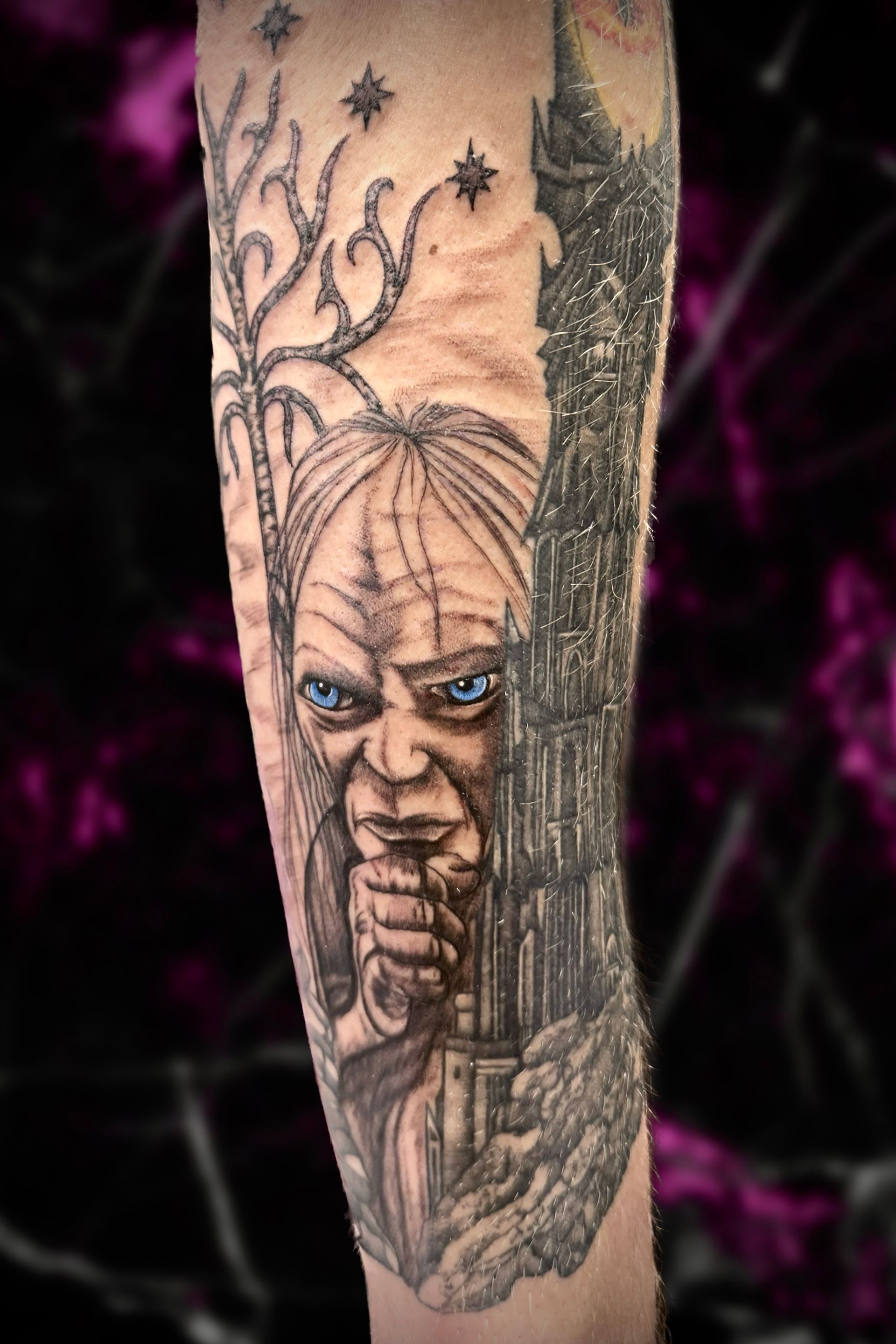 A person has a tattoo of a wizard on their leg