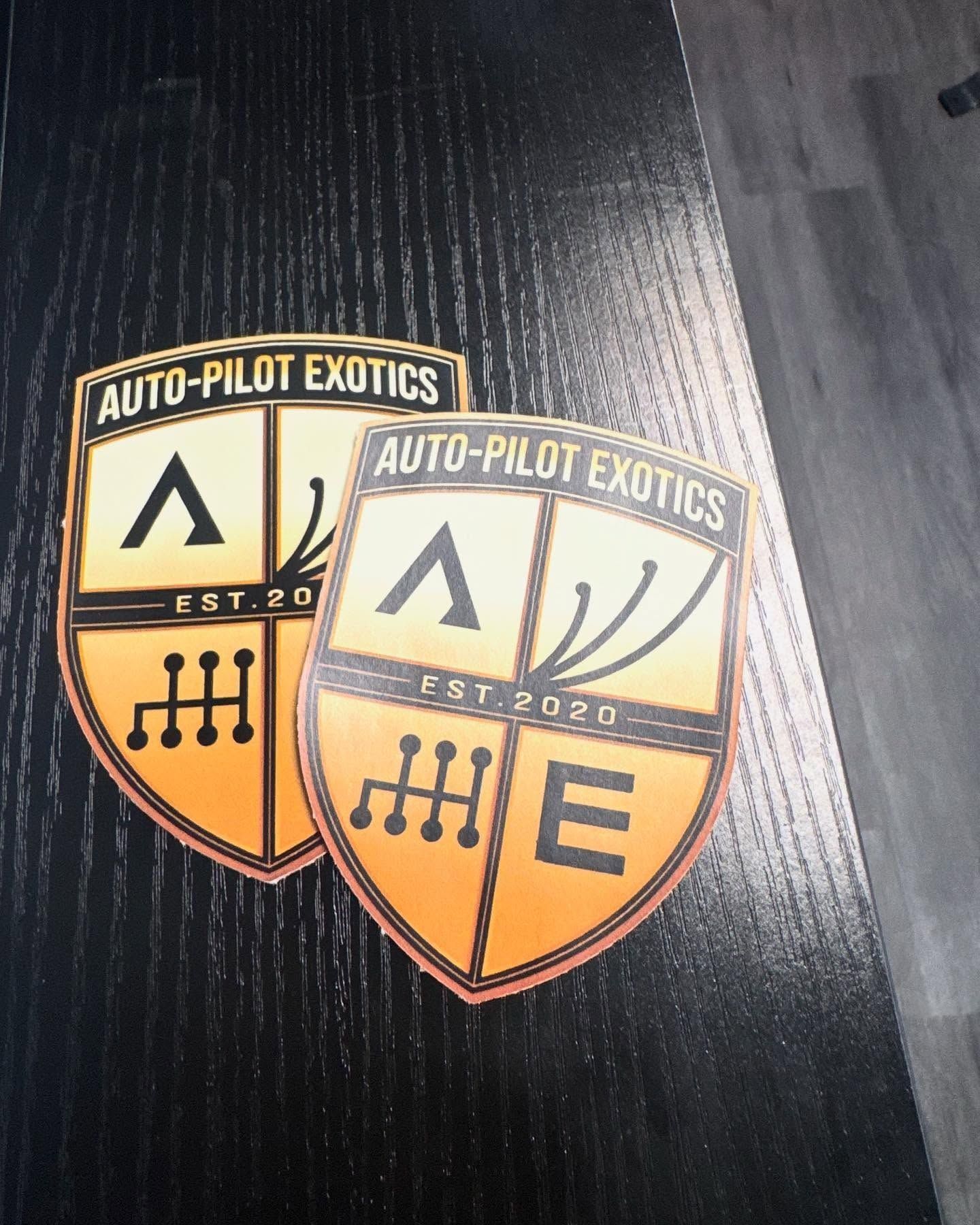 Two shield-shaped stickers: 