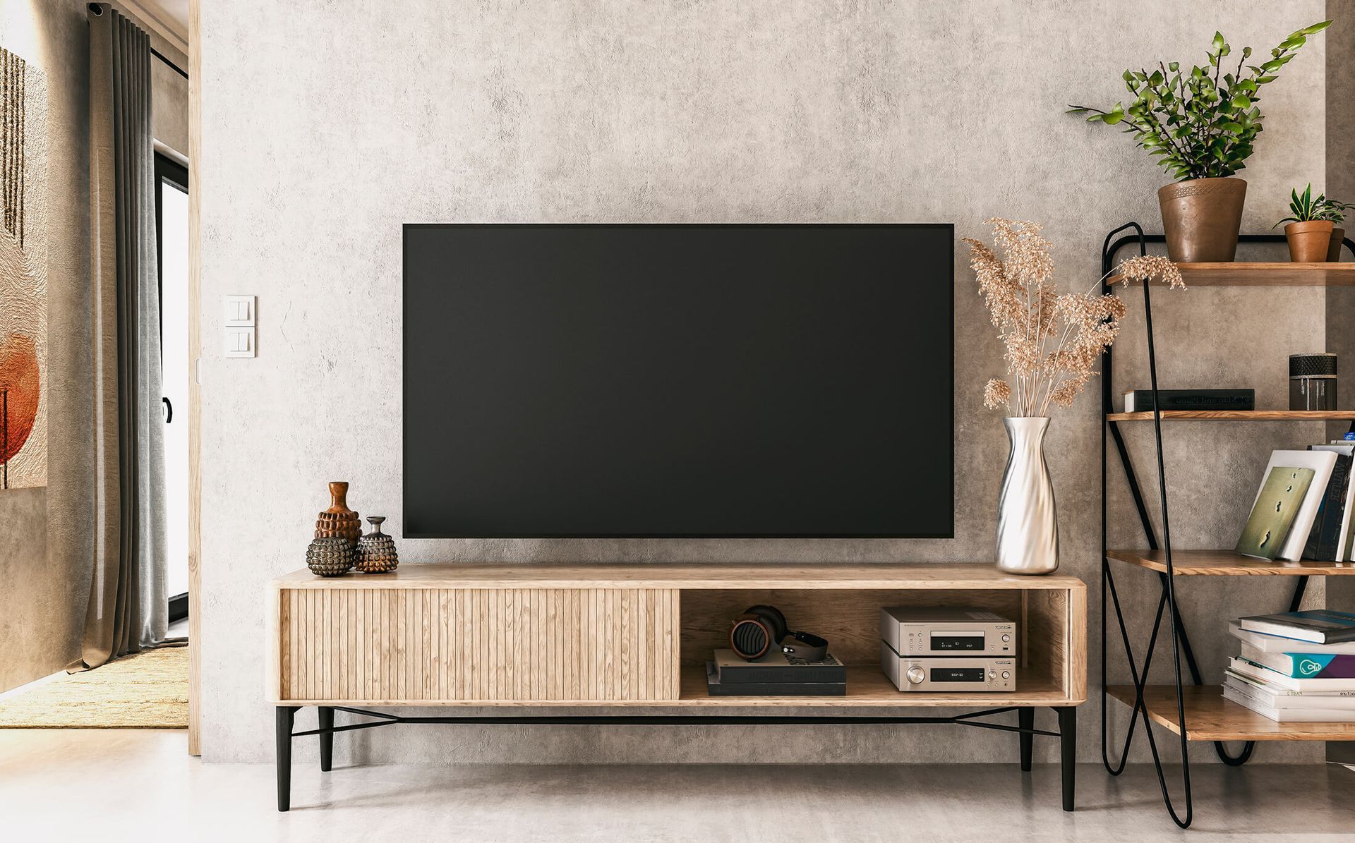 A flat screen tv is sitting on top of a wooden entertainment center.