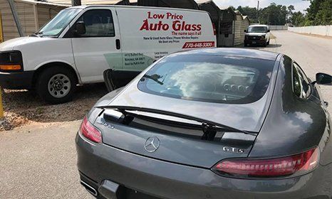 Business truck and gray Mercedes