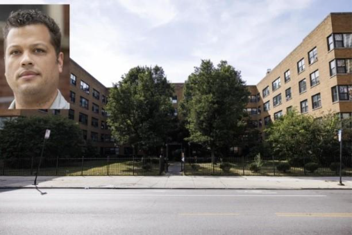 A building with trees and a picture of a man in the top-left side.