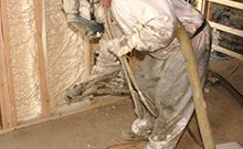 A man doing Cellulose insulation