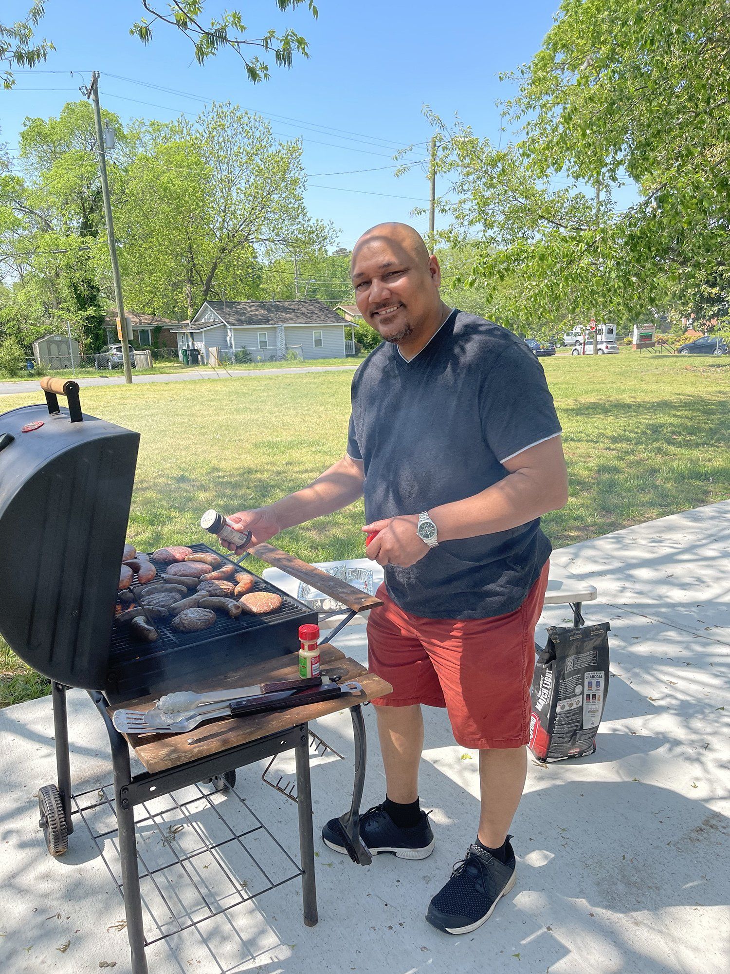 Man grilling sausages