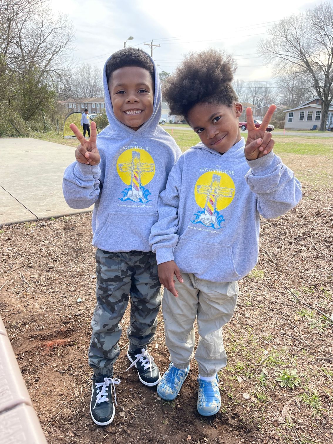 Two young boys in grey hoodies