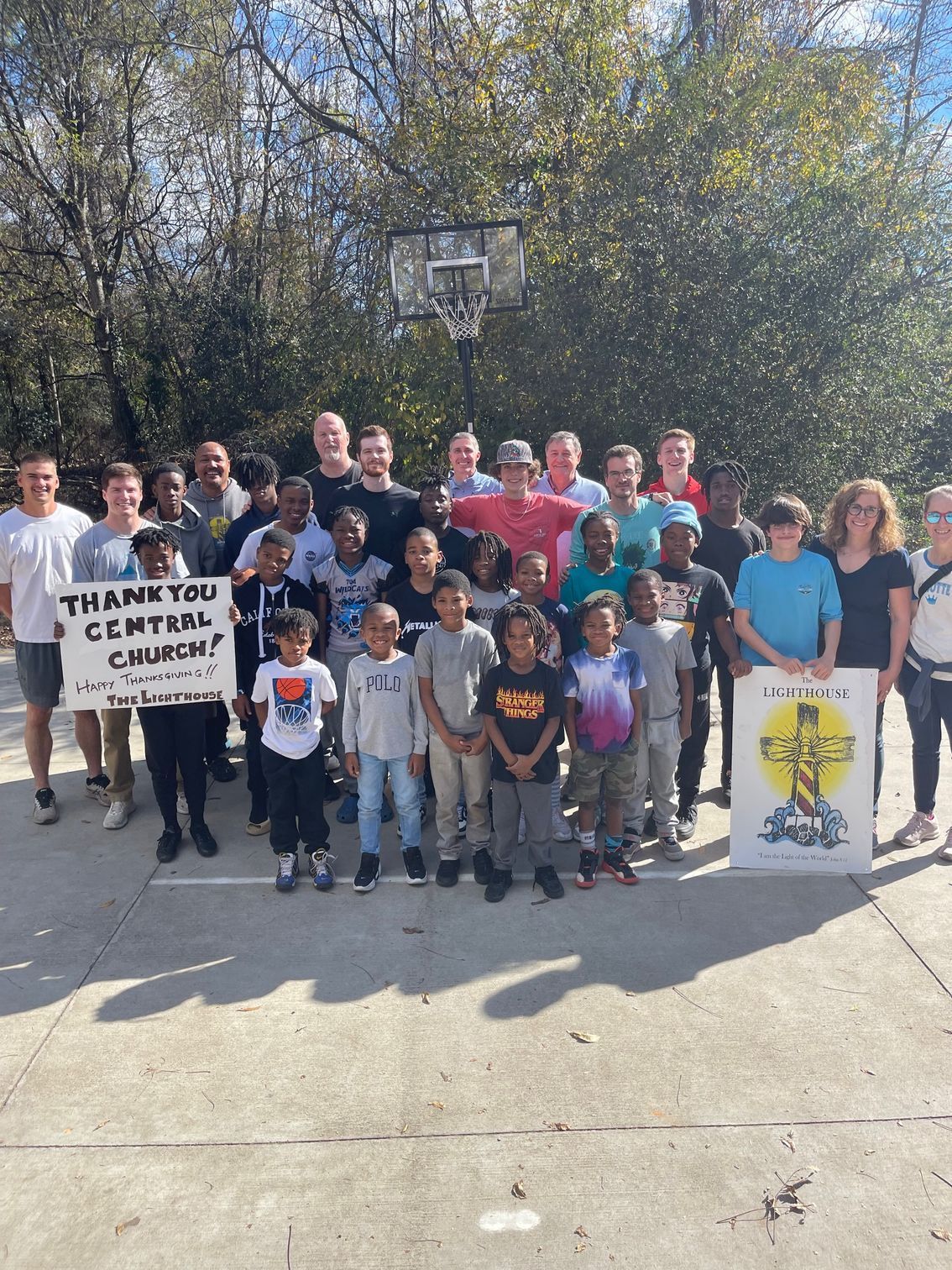 Group photo in an open basketball court