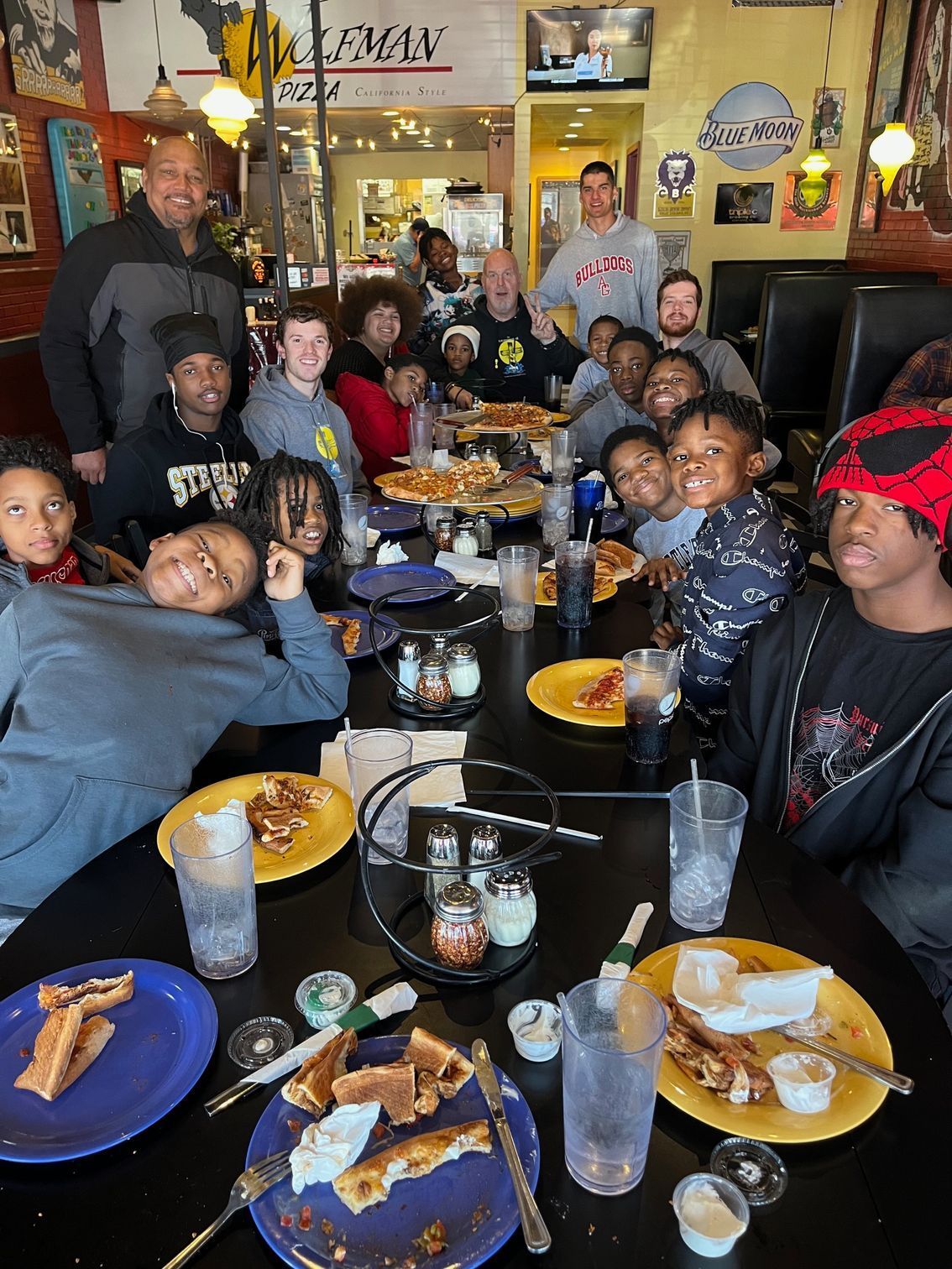 Wacky group photo in a pizza restaurant