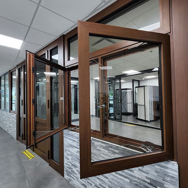 A building with a lot of windows and a door that is open.