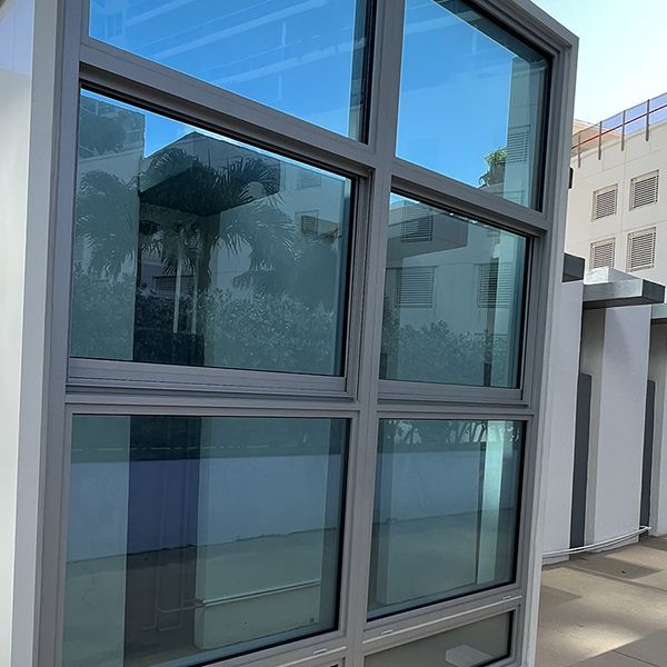 A building with a lot of windows and a lot of glass.