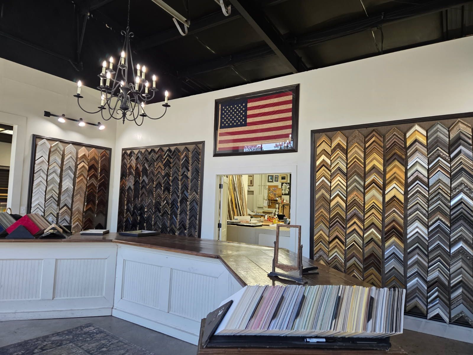 There is a large american flag on the wall above the counter