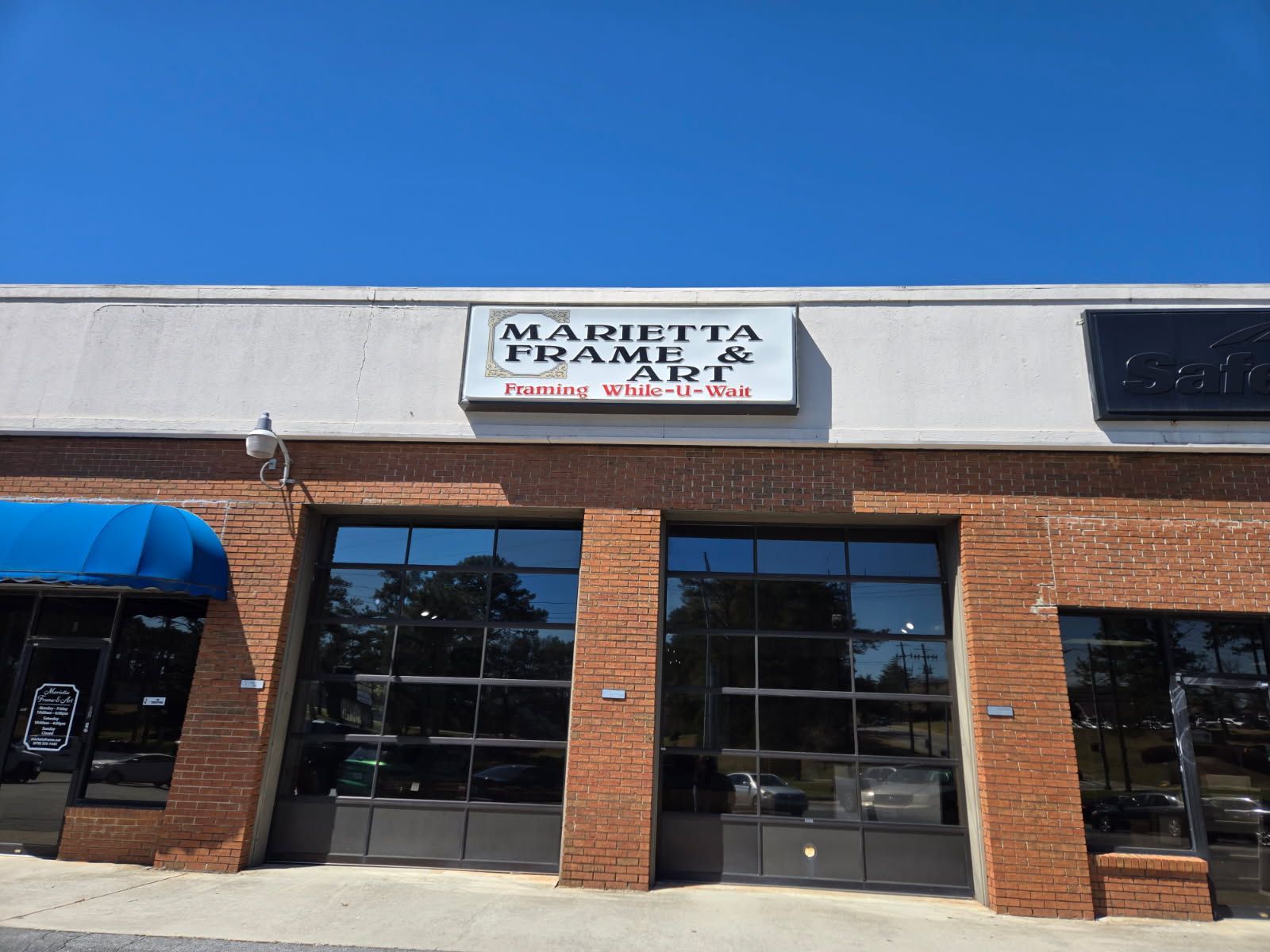 A building with a sign that says marietta plumbing