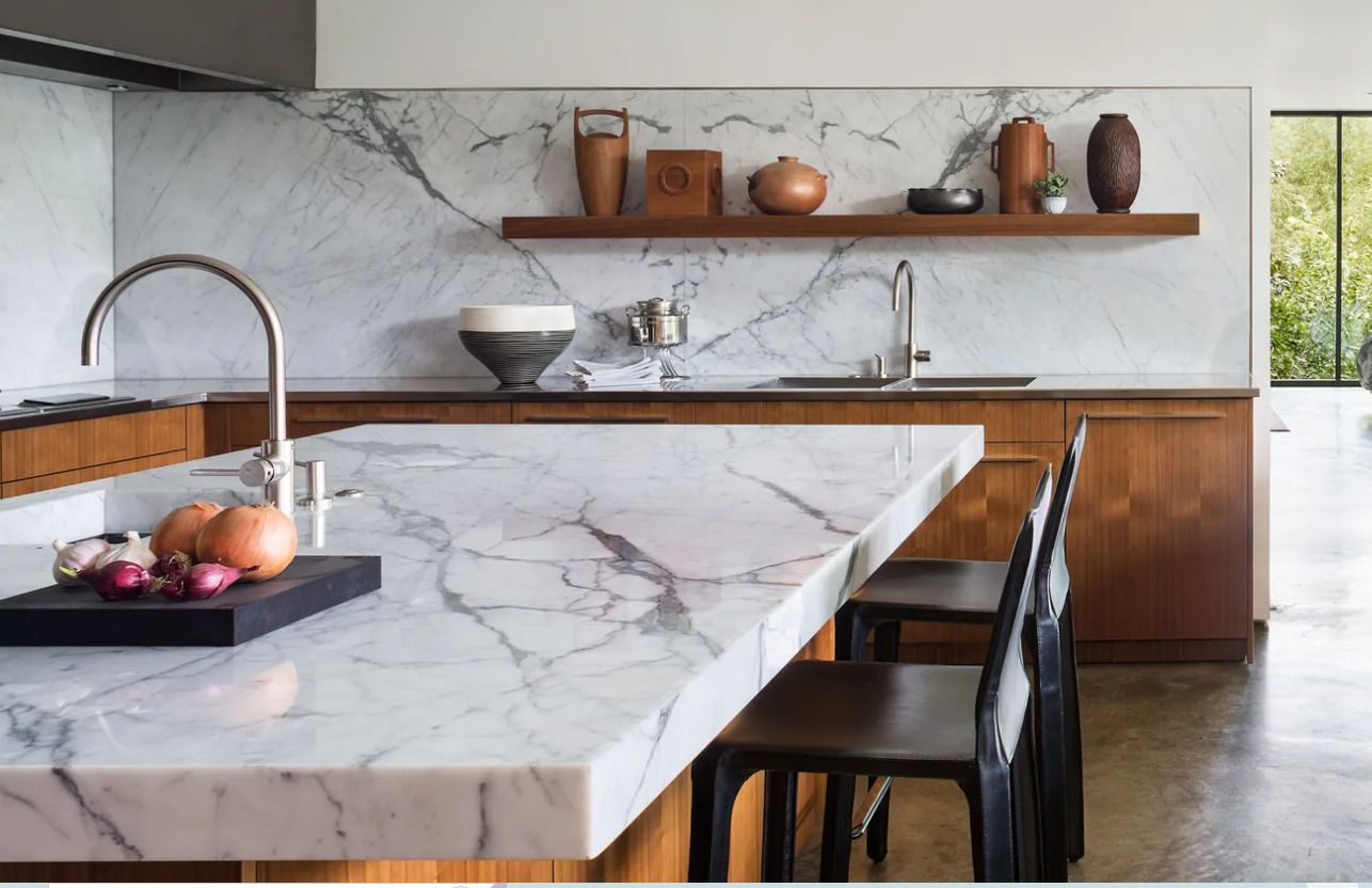 Kitchen with white cabinets and stainless steel appliances.